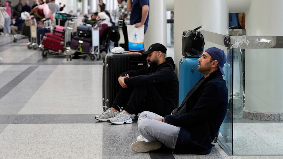 PHOTO: Passengers whose flights were cancelled wait at the departure terminal of Rafik Hariri International Airport in Beirut, Lebanon, on Feb. 28, 2026, as many airlines canceled flights due to the conflict involving the United States, Israel and Iran. 
