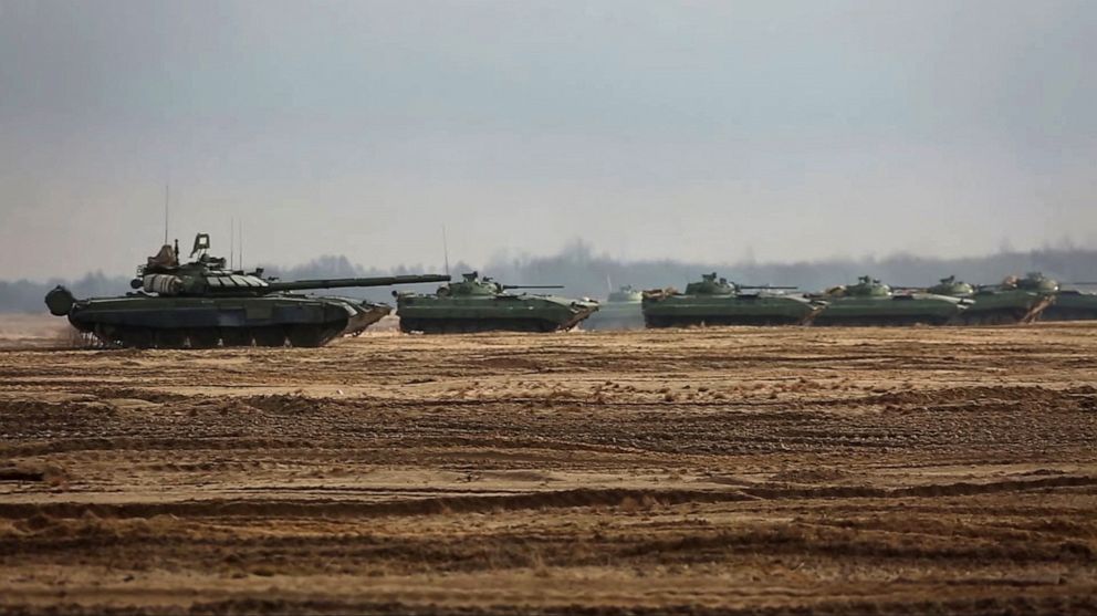PHOTO: Military vehicles drive during the Union Courage 2022 joint military exercise of the armed forces of Russia and Belarus, at the Brestsky training ground in Brest Region, Belarus, in this still image taken from video released, Feb. 11, 2022.