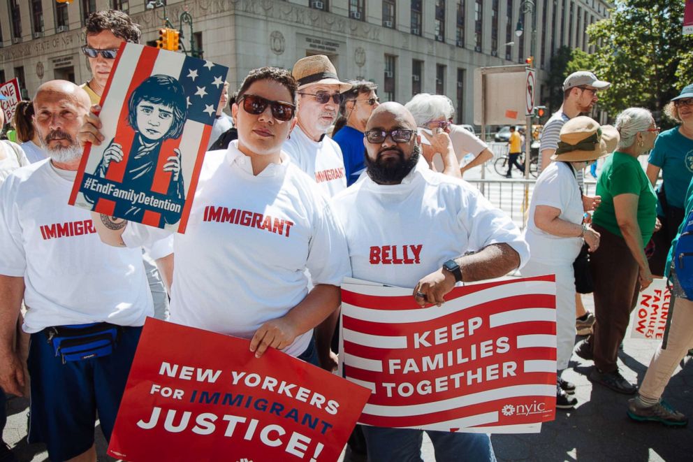 PHOTO: Protestors wear Belly "Immigrant" T-shirts during an "End Family Separation Rally & March" in New York City.