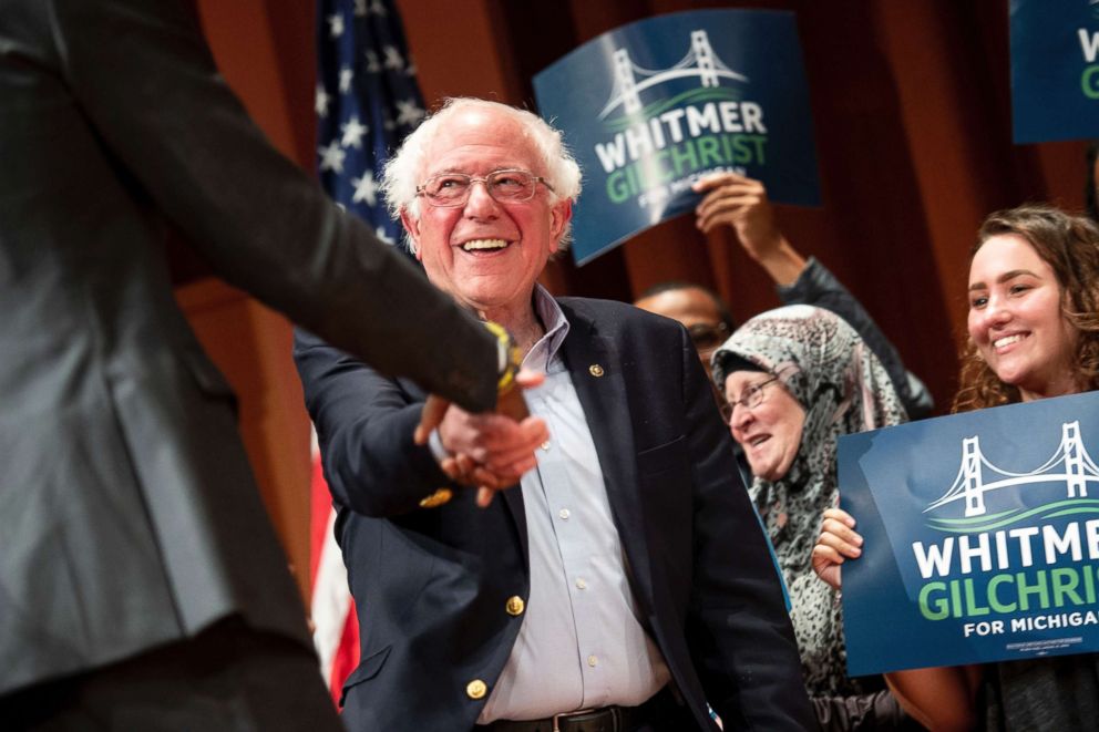 PHOTO: Sen. Bernie Sanders, I-Vt., shakes the hand of Garlin Gilchrist II, Democratic nominee for Lt. Governor, as he arrives at a Michigan Democratic Party rally in Ann Arbor, Mich., Oct. 19, 2018. 