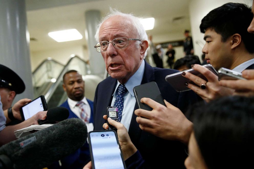 PHOTO: Sen. Bernie Sanders speaks with reporters during the impeachment trial of President Donald Trump on charges of abuse of power and obstruction of Congress on Capitol Hill in Washington, Jan. 29, 2020.