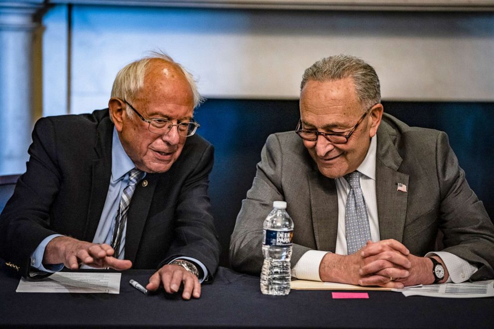 PHOTO: Senate Majority Leader Chuck Schumer and Committee Chairman Bernie Sanders  hold a meeting with Senate Budget Committee Democrats at the U.S. Capitol on June 16, 2021 in Washington, D.C.