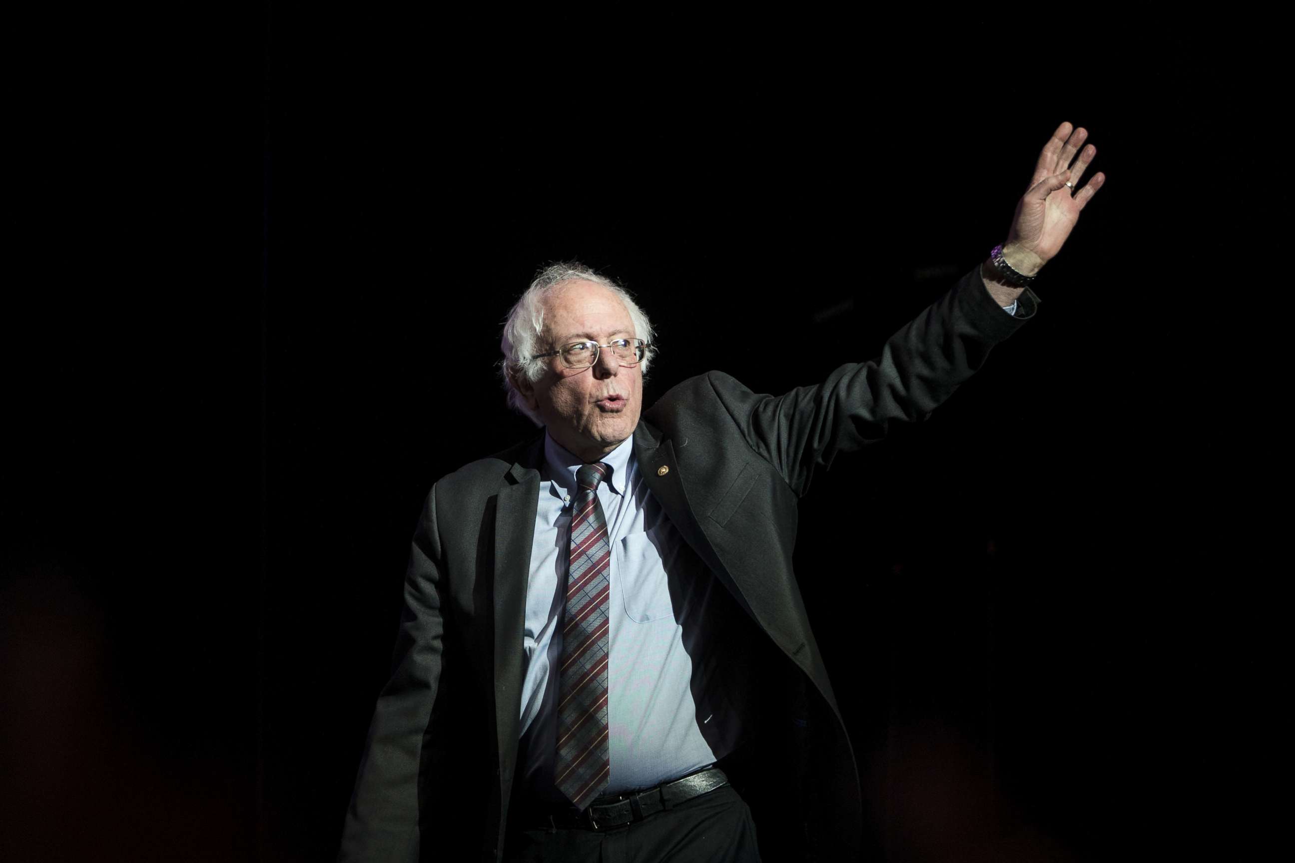 PHOTO: Former Presidential candidate Senator Bernie Sanders waves as he takes the stage at the Our Revolution Massachusetts Rally at the Orpheum Theater, March 31, 2017 in Boston. 