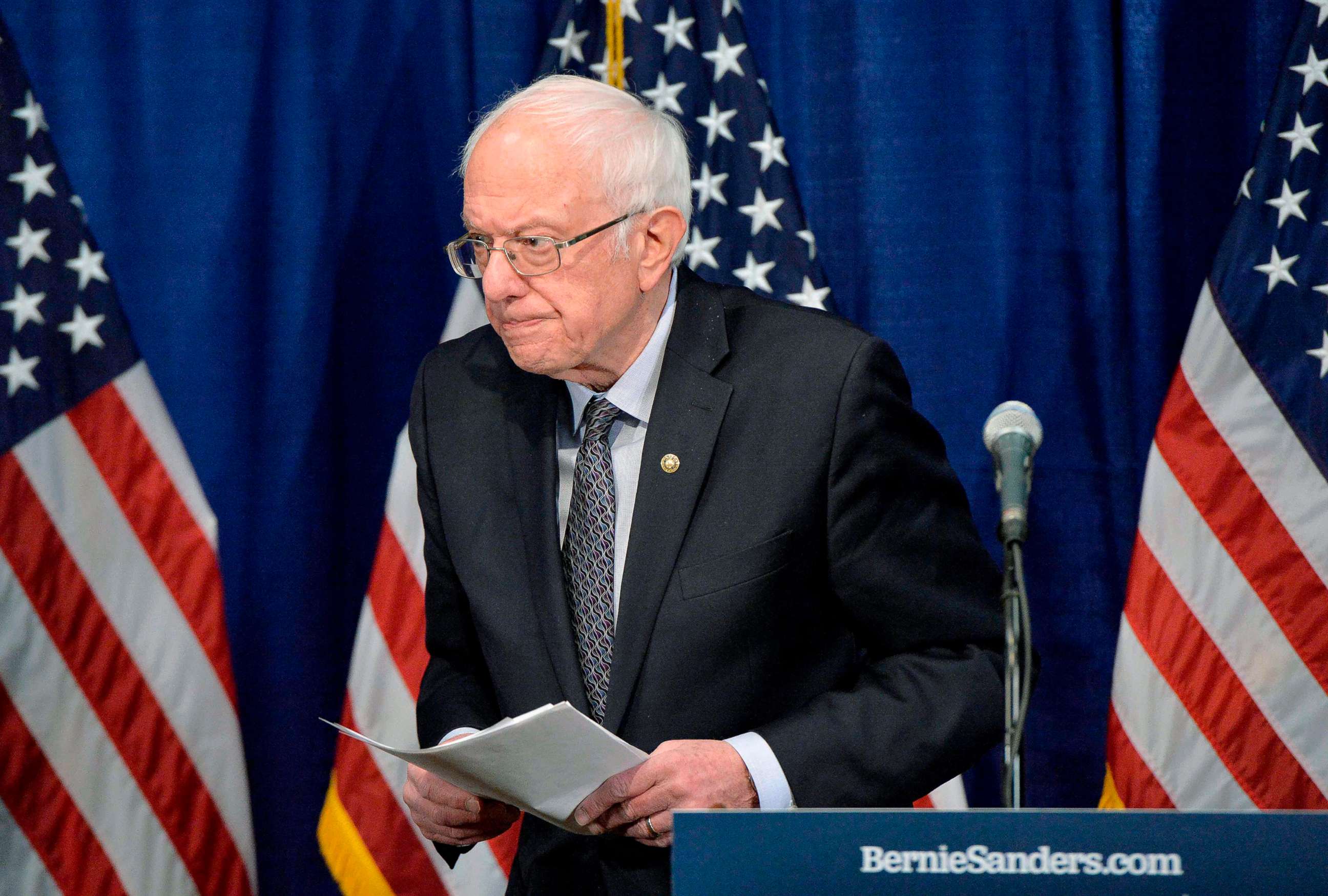 PHOTO: Democratic presidential candidate Senator Bernie Sanders leaves after speaking to the press in Burlington, Vt., March 11, 2020.