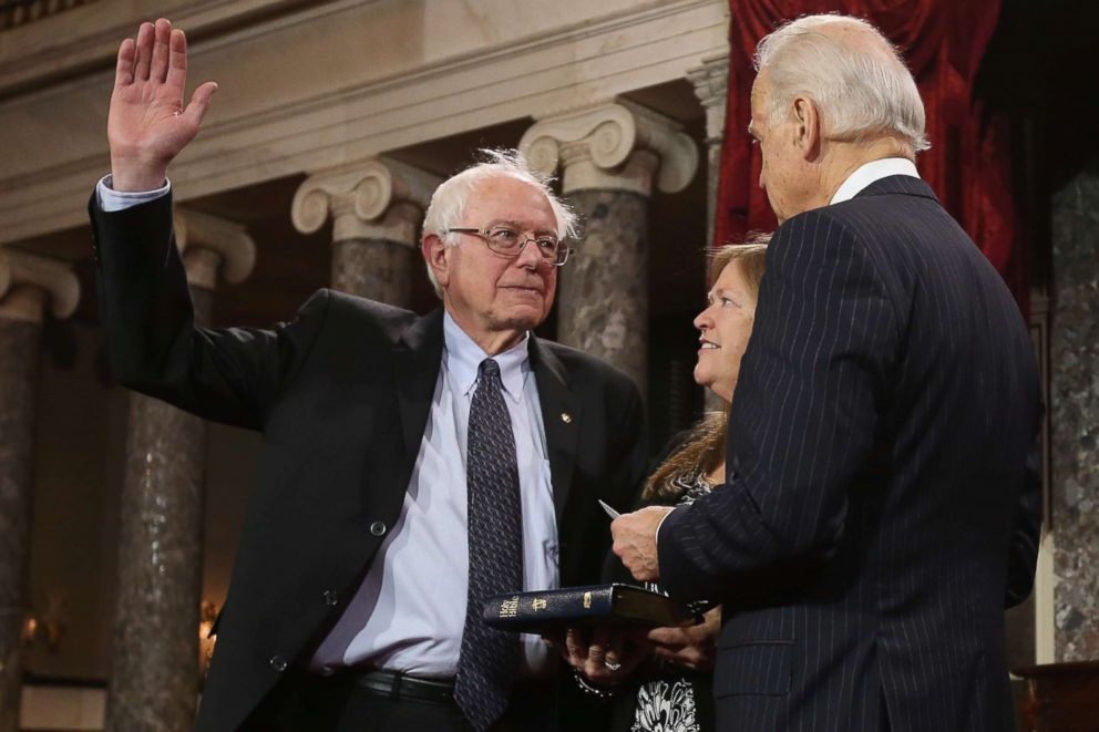 PHOTO: Sen. Bernie Sanders participates in a reenacted swearing-in with his wife  Jane OÃ?Meara Sanders and Vice President Joe Biden in the Old Senate Chamber at the U.S. Capitol, Jan. 3, 2013 in Washington.