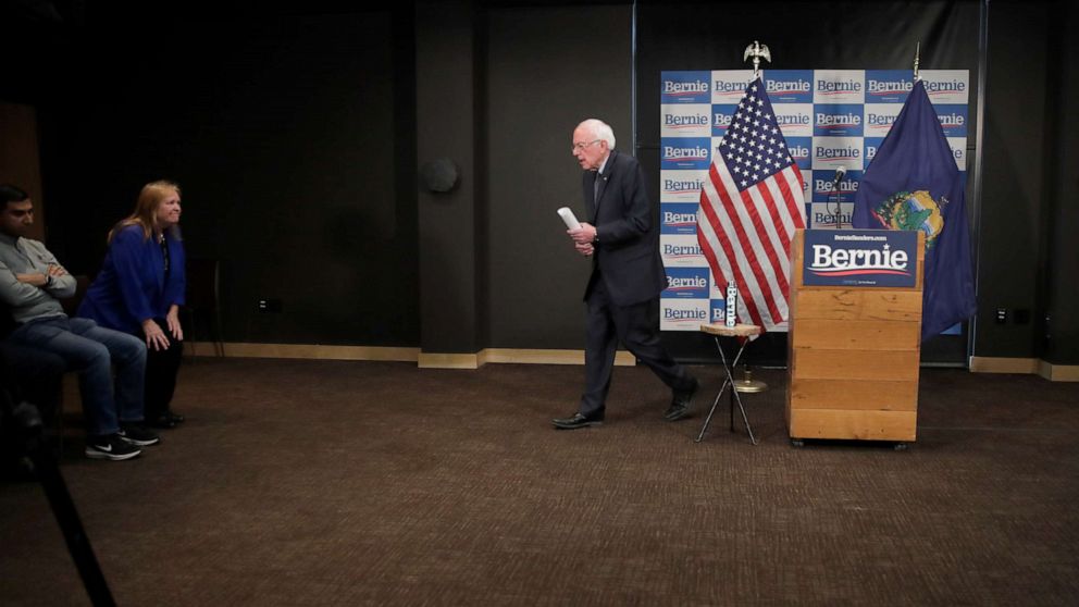 PHOTO: Democratic presidential candidate Sen. Bernie Sanders, I-Vt., walks from the podium after speaking to reporters about coronavirus Thursday, March 12, 2020, in Burlington, Vt.