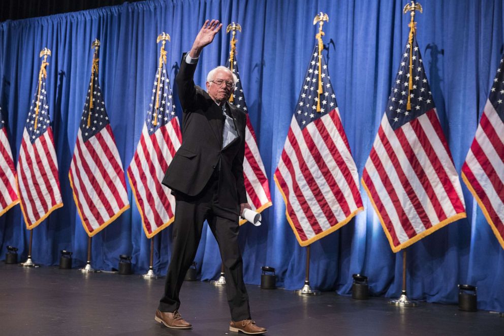 PHOTO: Democratic presidential candidate Sen. Bernie Sanders waves as he exits after delivering remarks at a campaign function in the Marvin Center at George Washington University on June 12, 2019, in Washington.