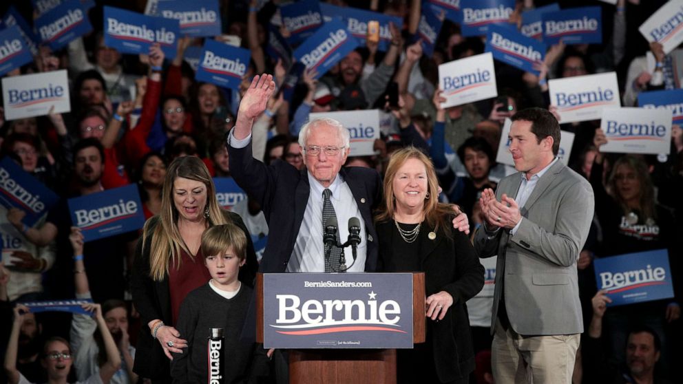 PHOTO: Democratic presidential candidate Sen. Bernie Sanders with his wife Jane Sanders and family addresses supporters during his caucus night watch party on Feb. 03, 2020 in Des Moines, Iowa.