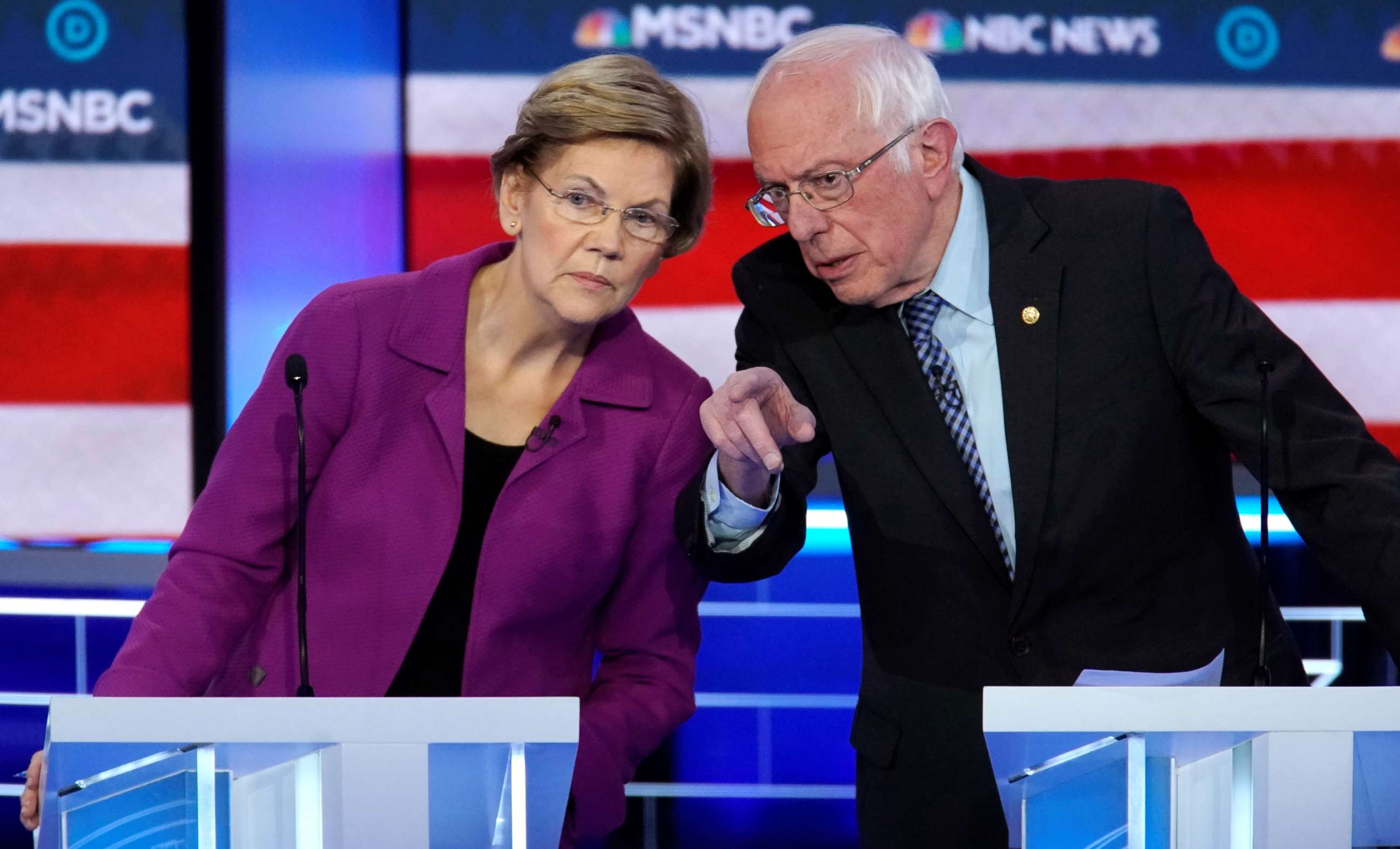 PHOTO: Senator Elizabeth Warren listens to Senator Bernie Sanders during the ninth Democratic 2020 U.S. Presidential candidates debate at the Paris Theater in Las Vegas, Nevada, U.S., February 19, 2020.