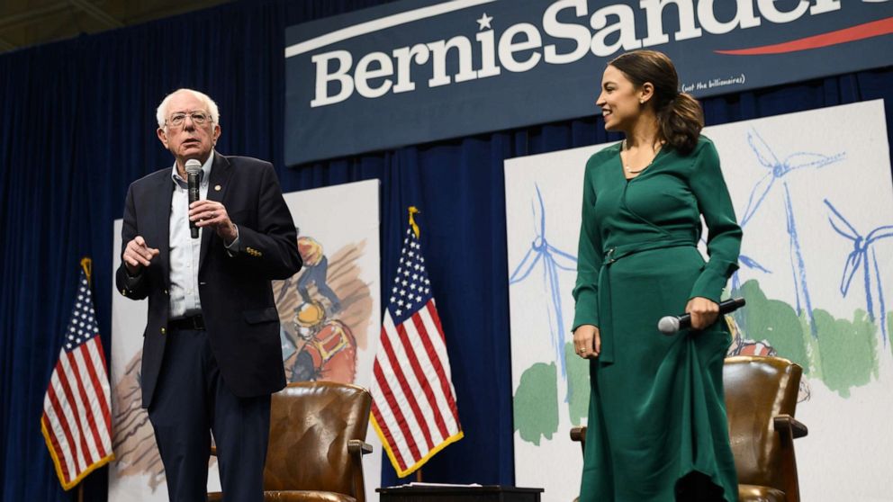 PHOTO: Sen. Bernie Sanders, I-Vt., and Rep. Alexandria Ocasio-Cortez, D-N.Y., field questions from audience members at the Climate Crisis Summit at Drake University Nov. 9, 2019 in Des Moines, Iowa.