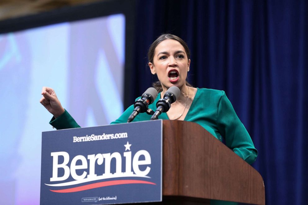 PHOTO: Rep. Alexandria Ocasio-Cortez, D-N.Y., speaks before introducing Democratic 2020 U.S. presidential candidate Sen. Bernie Sanders, I-Vt., during a Climate Crisis Summit at Drake University in Des Moines, Iowa, Nov. 9, 2019.