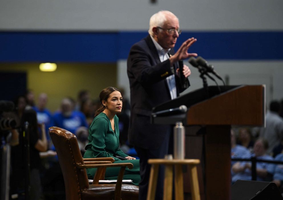 PHOTO: Sen. Bernie Sanders, I-Vt., and Rep. Alexandria Ocasio-Cortez, D-N.Y., field questions from audience members at the Climate Crisis Summit at Drake University Nov. 9, 2019 in Des Moines, Iowa.