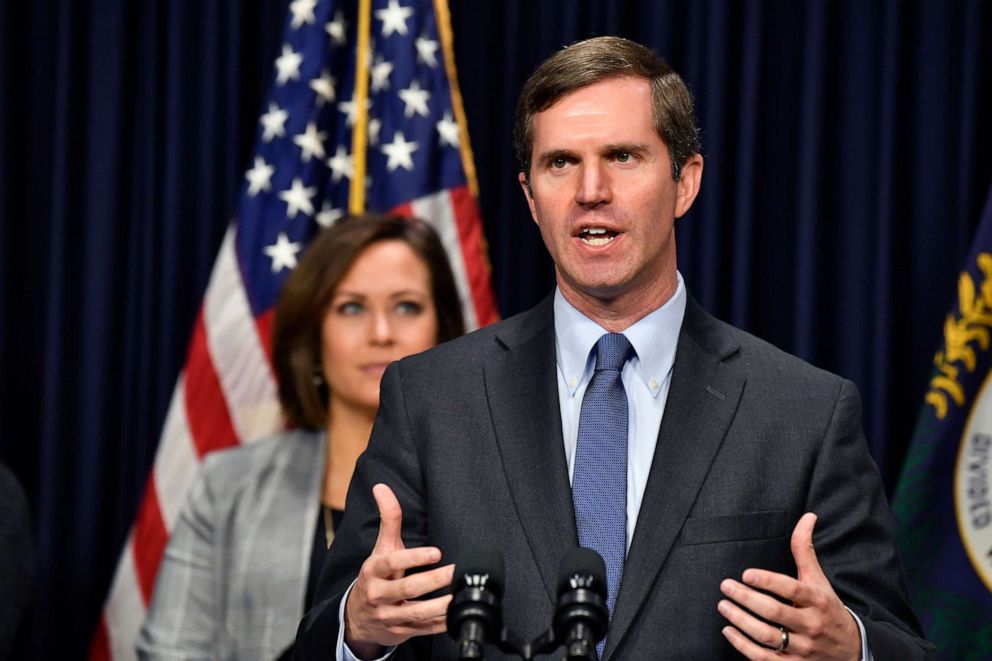 PHOTO: Kentucky Gov. Andy Beshear, right, and Lt. Gov. Jacqueline Coleman speak with the media during a press conference at the Kentucky state Capitol in Frankfort, Ky., Jan. 7, 2020.