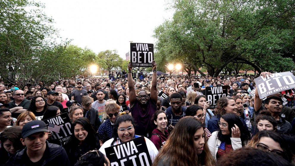 PHOTO: A supporter holds up a sign as he waits for Democratic presidential candidate and former Texas congressman Beto O'Rourke to take the stage for his presidential campaign kickoff rally in Houston, Saturday, March 30, 2019.