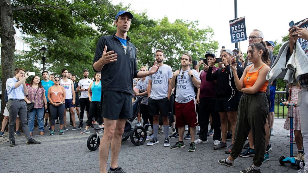 PHOTO: Democratic presidential candidate Beto O'Rourke talks to members and friends of the LGBTQ community before participating in a 2-mile run, June 12, 2019 in New York.