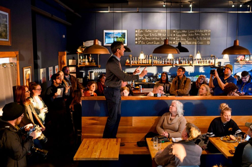PHOTO: Former Texas Congressman and Democratic party Presidential Beto O'Rourke speaks to diners at The Pig & Porter restaurant in Cedar Rapids, Iowa, March 15, 2019. 