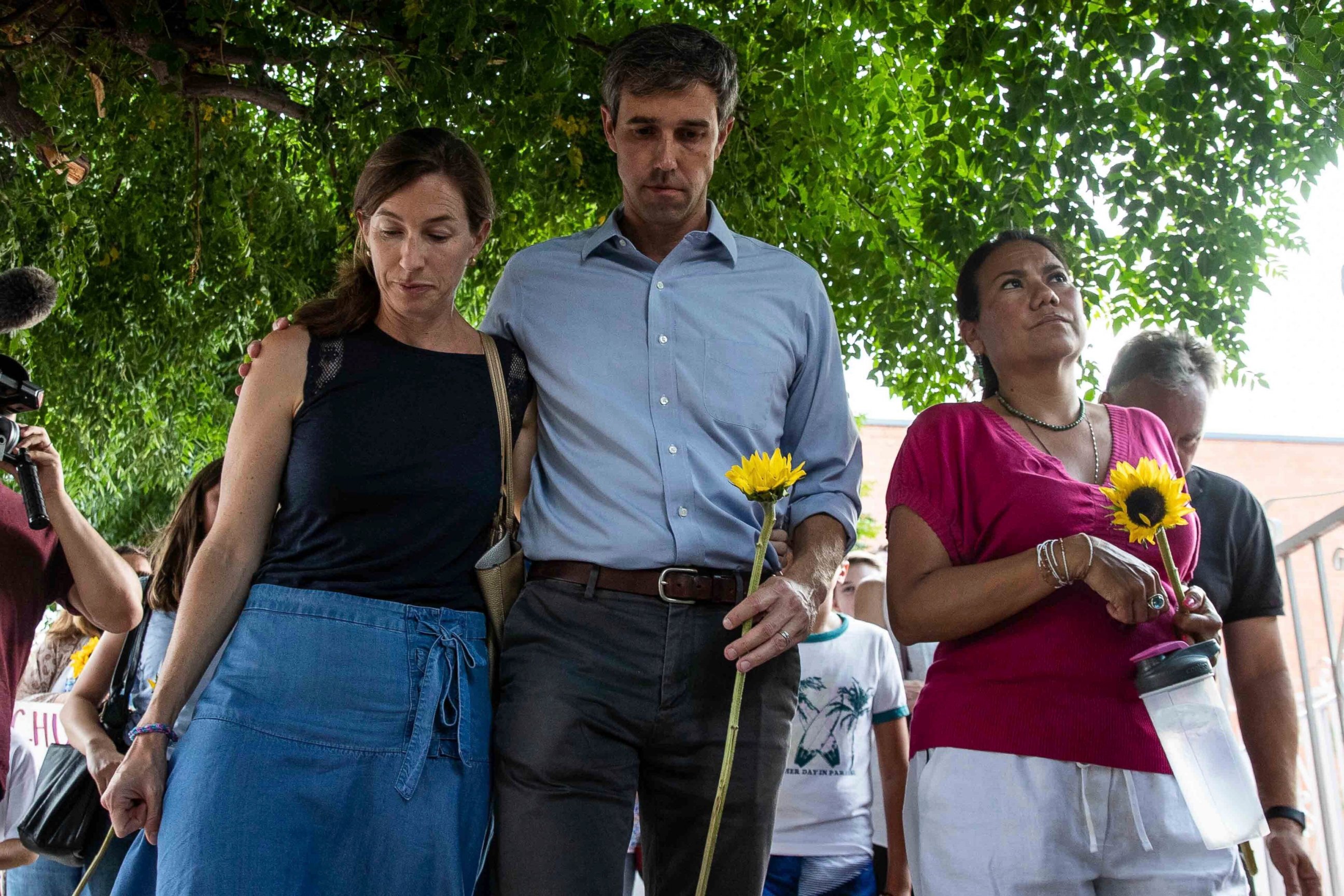 PHOTO: Democratic presidential candidate Beto O'Rourke walks next to his wife Amy Hoover Sanders and Rep. Veronica Escobar Sunday, Aug. 4, 2019.