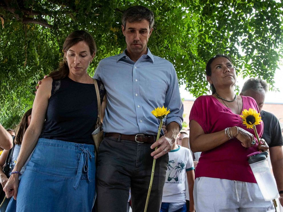 PHOTO: Democratic presidential candidate Beto ORourke walks next to his wife Amy Hoover Sanders and Rep. Veronica Escobar Sunday, Aug. 4, 2019.