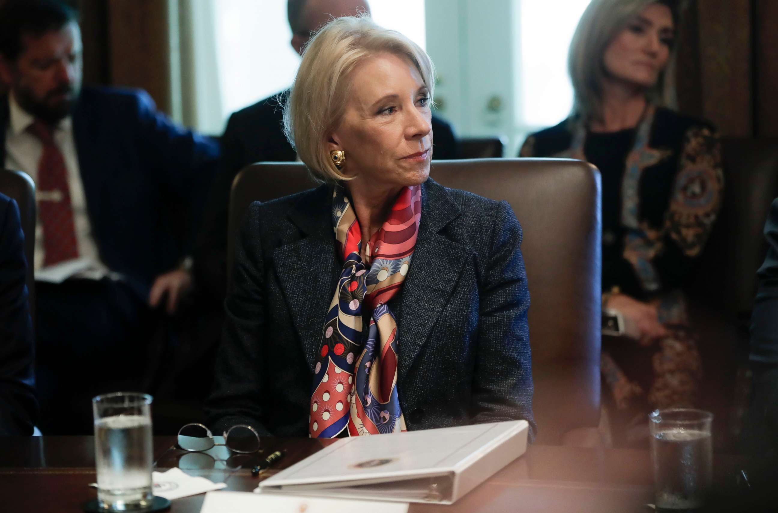 PHOTO: Education Secretary Betsy DeVos listens to President Donald Trump during a Cabinet meeting in the Cabinet Room of the White House in Washington, Oct. 21, 2019.