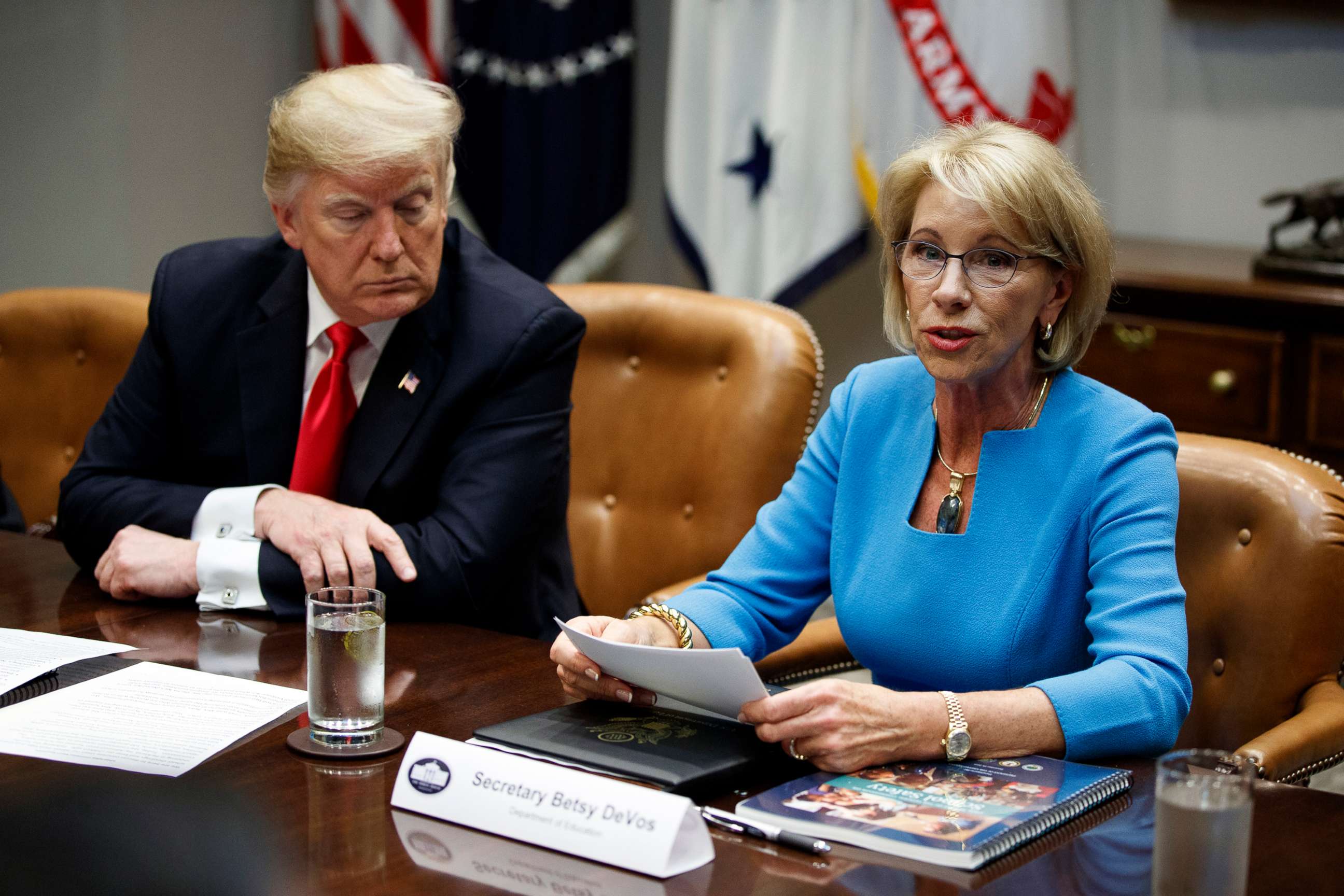 PHOTO: In this Dec. 18, 2018, file photo, President Donald Trump listens as Secretary of Education Betsy DeVos speaks during a roundtable discussion on the Federal Commission on School Safety report, in the Roosevelt Room of the White House in Washington.