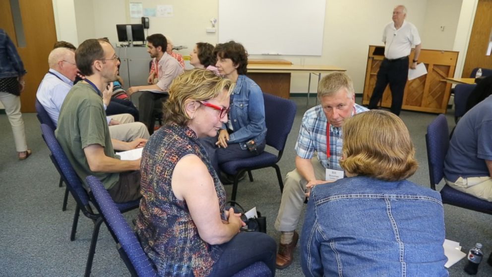 PHOTO: At the Braver Angels convention, Bill Doherty had participants from different groups talk to each other in one-on-one meetings. 