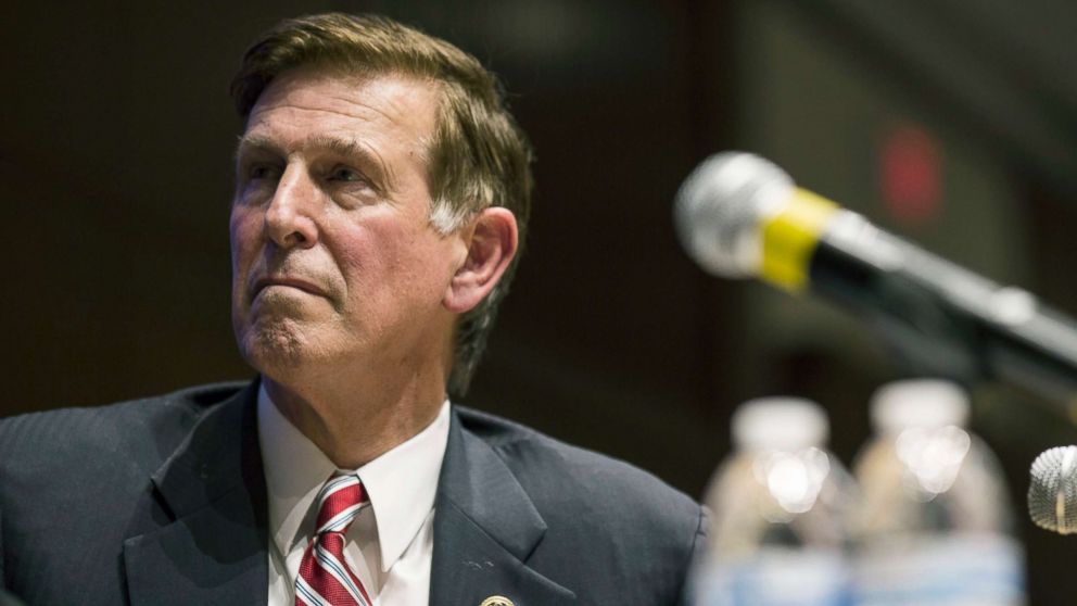 Rep. Don Beyer (D-Va.) listens as Democratic presidential candidate Bernie Sanders (I-Vt.) speaks before a crowd at the National Rural Electric Cooperative Association in Arlington, Va., July 9, 2015. 