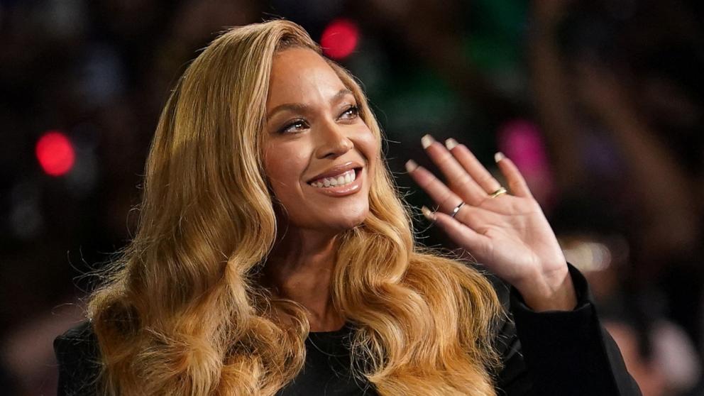 PHOTO: Singer Beyonce waves as she attends a campaign rally of Democratic presidential nominee U.S. Vice President Kamala Harris, in Houston, Oct. 25, 2024.