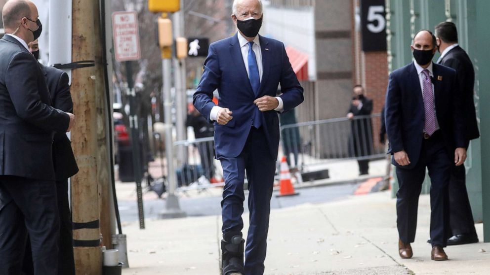 PHOTO: U.S. President-elect Joe Biden, wearing an orthotic boot to protect his injured foot, arrives to announce nominees and appointees to serve on his economic policy team at his transition headquarters in Wilmington, Del.,  Dec. 1, 2020.