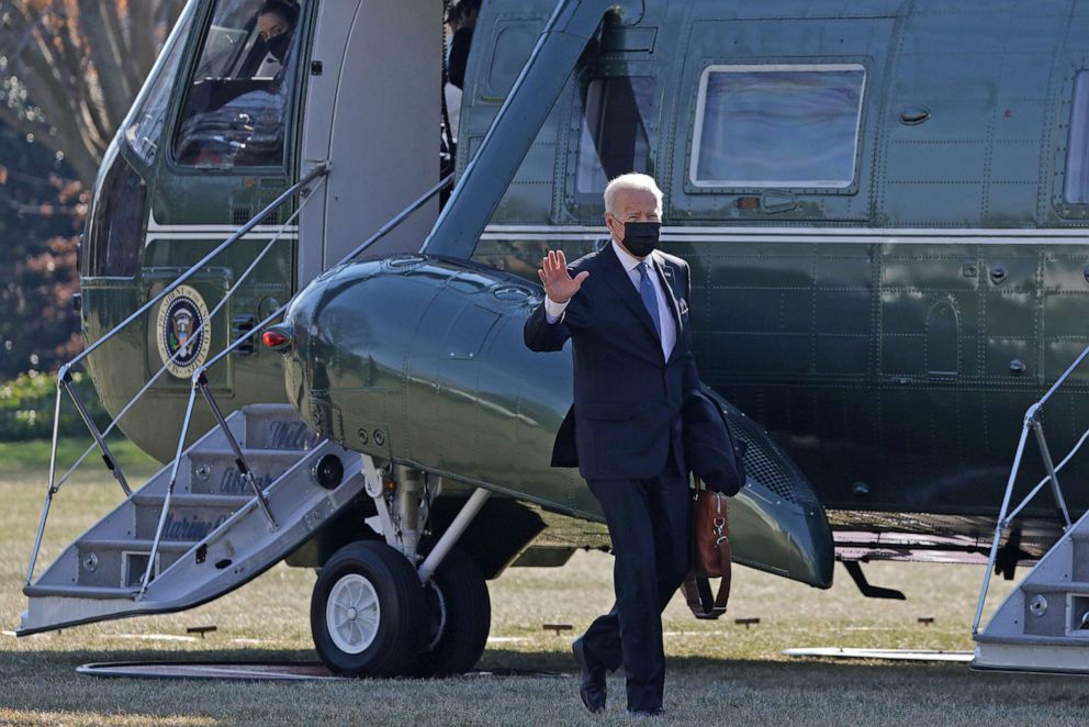 PHOTO: President Joe Biden walks on the South Lawn after returning to the White House on Marine One on Jan. 24, 2022 in Washington, D.C. President Biden spent the weekend at Camp David.