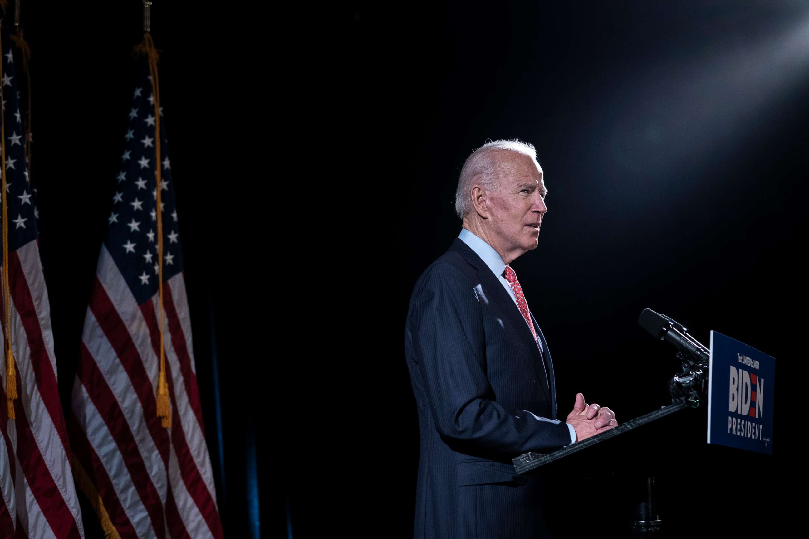 PHOTO: WILMINGTON, DE - MARCH 12: Democratic presidential candidate former Vice Democratic presidential candidate former Vice President Joe Biden delivers remarks about the coronavirus outbreak, at the Hotel Du Pont March 12, 2020 in Wilmington, Delaware.