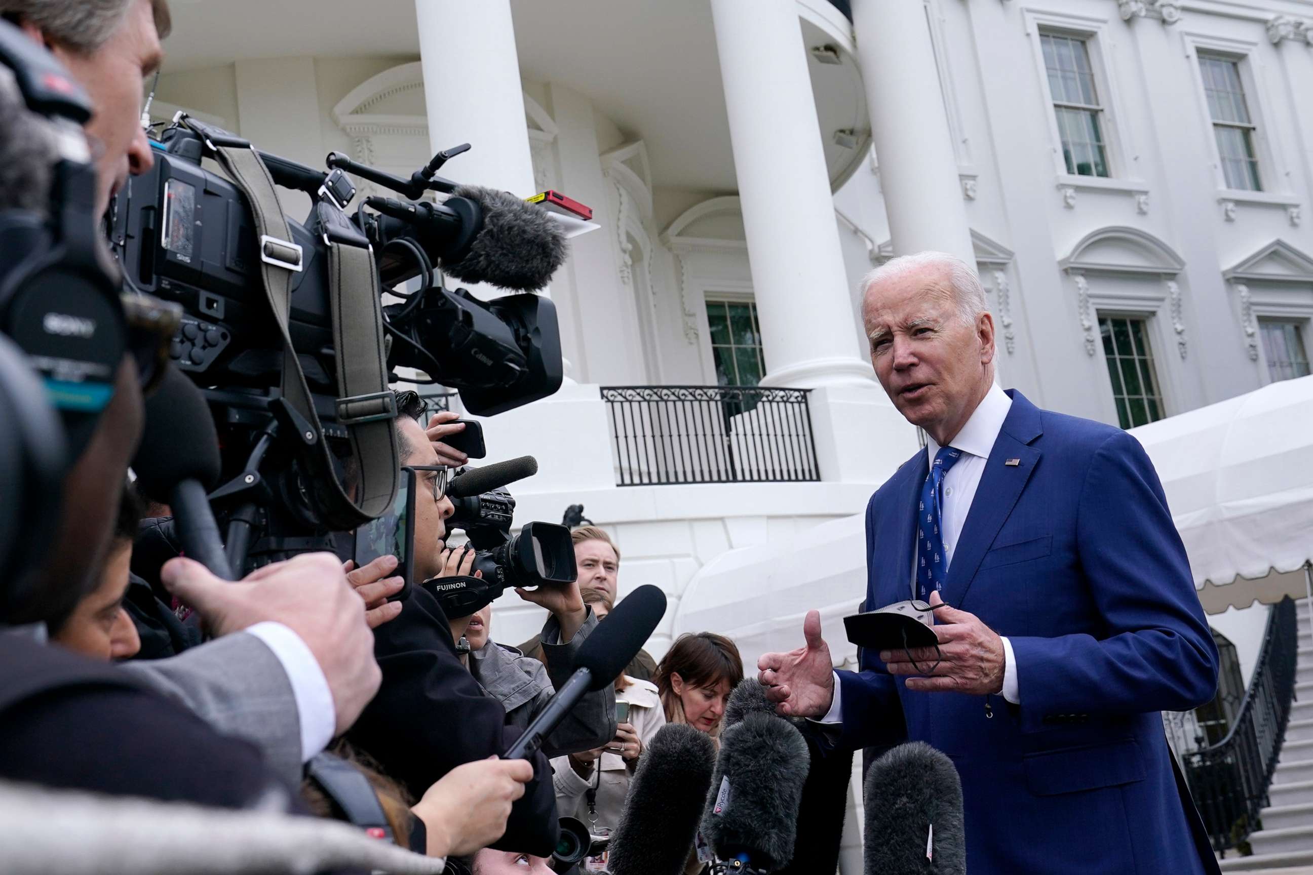PHOTO: President Joe Biden talks with reporters outside of the White House, Jan. 4, 2023, in Washington.
