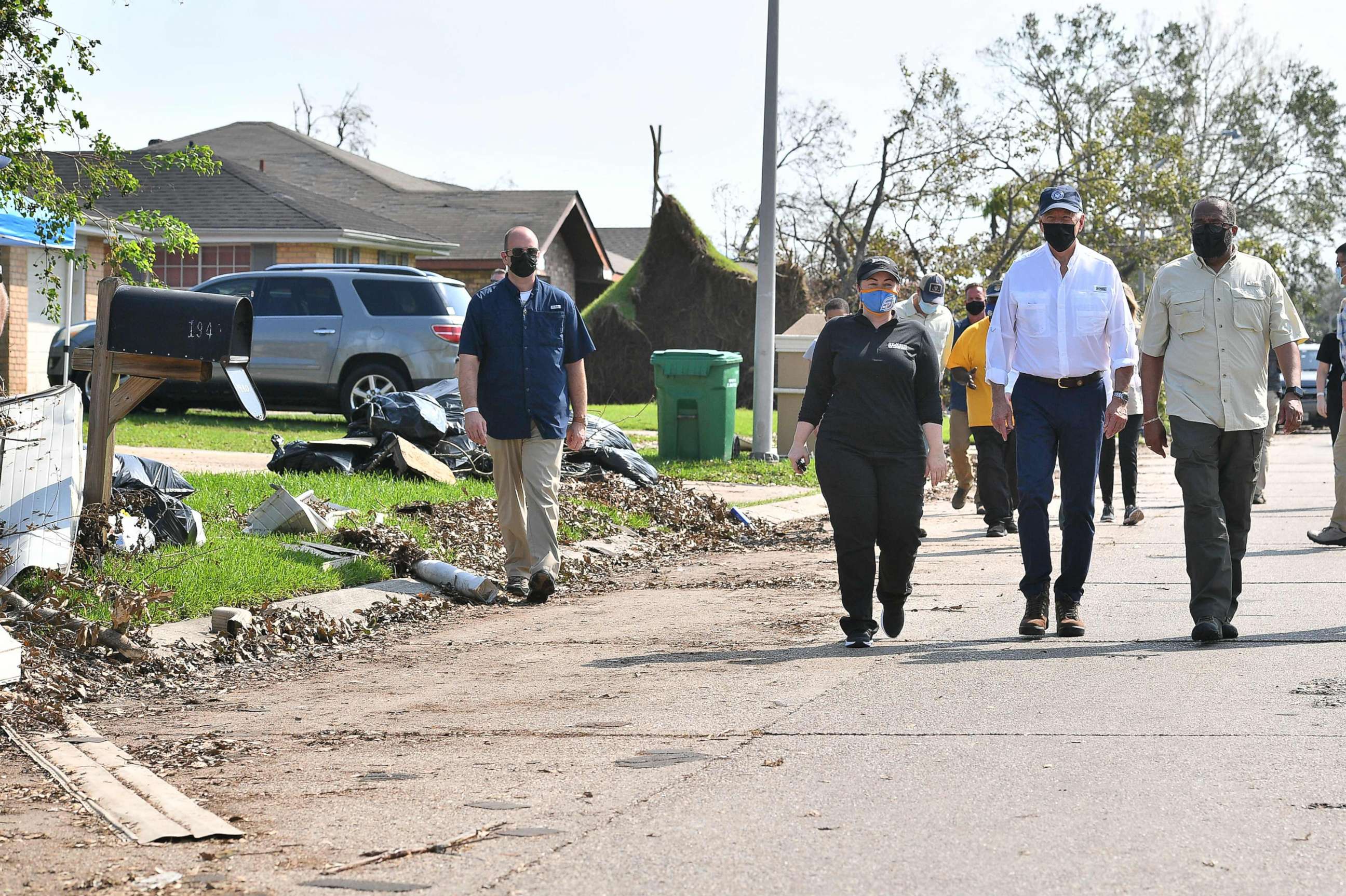 PHOTO: President Joe Biden walks in the street of the Cambridge neighborhood affected by Hurricane Ida, in LaPlace, La., Sept. 3, 2021. 