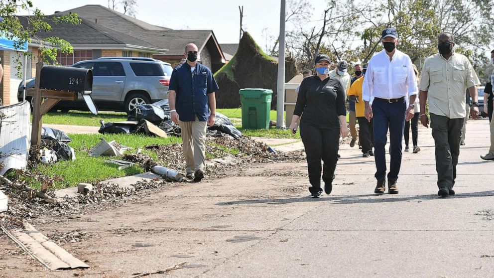 PHOTO: President Joe Biden walks in the street of the Cambridge neighborhood affected by Hurricane Ida, in LaPlace, La., Sept. 3, 2021.
