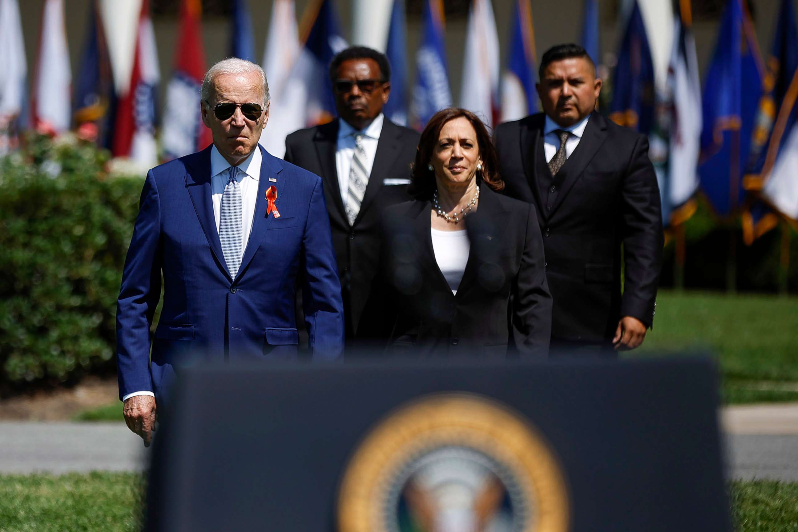PHOTO: President Joe Biden, Garnell Whitfield Jr., Vice President Kamala Harris and Dr. Dr. Roy Guerrero arrive for an event to celebrate the Bipartisan Safer Communities Act on the South Lawn of the White House, July 11, 2022.