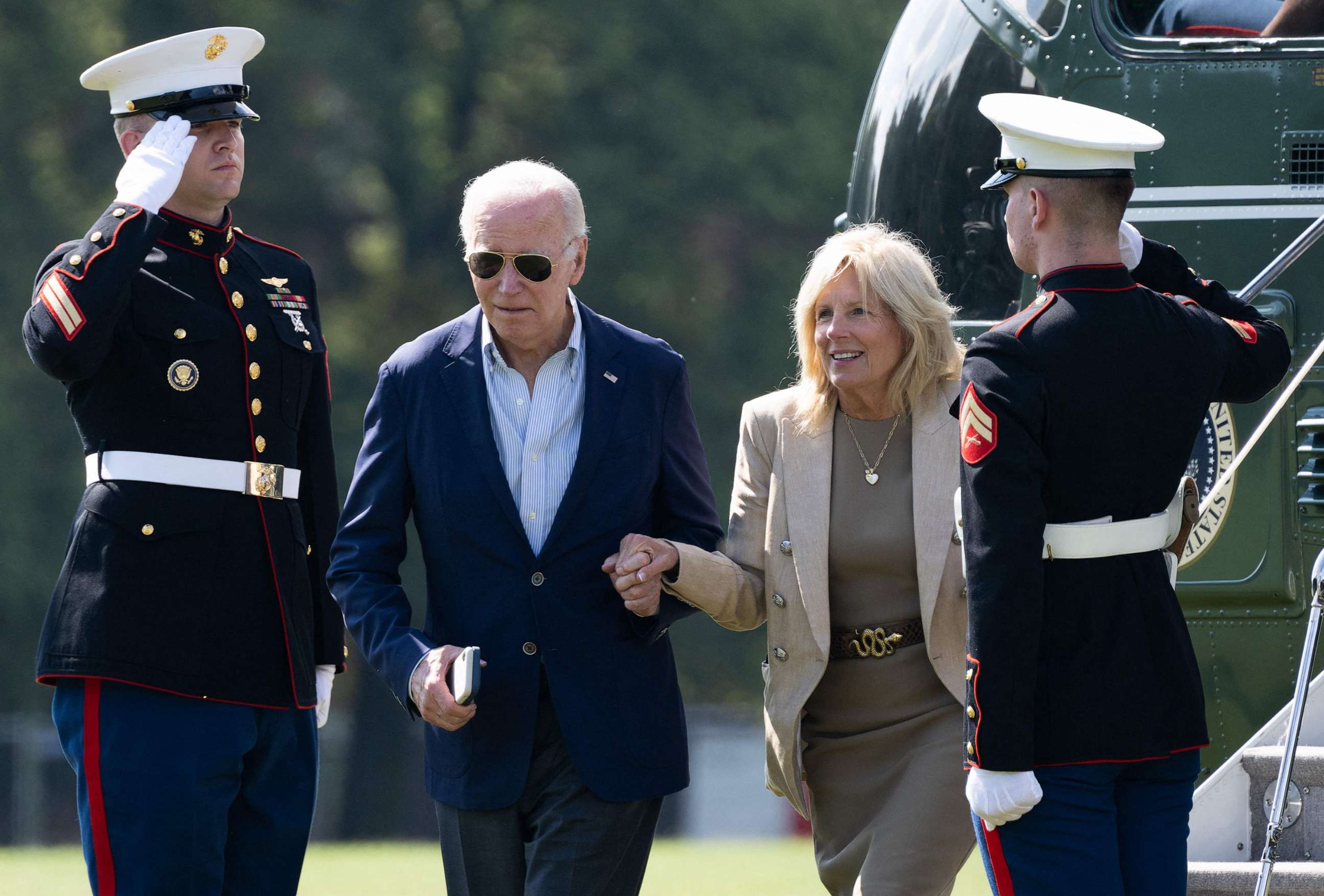PHOTO: President Joe Biden and First Lady Jill Biden disembark from Marine One upon arrival at Fort McNair in Washington, D.C., July 4, 2023.