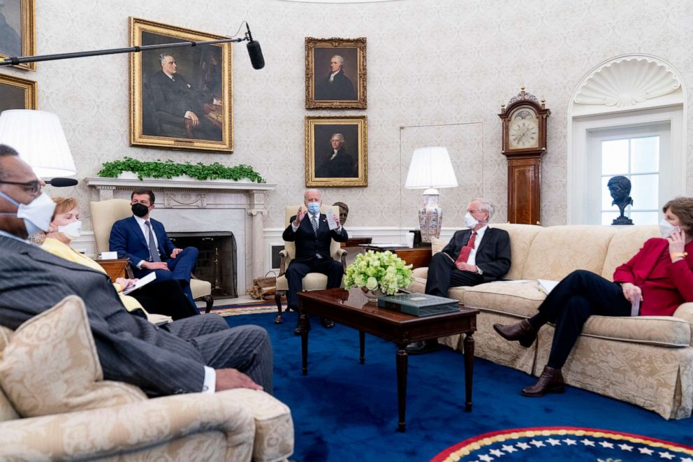 PHOTO: President Joe Biden meets with, from left, Rep. Emanuel Cleaver, Rep. Kay Granger, Transportation Secretary Pete Buttigieg, Sen. Angus King, Sen. Jeanne Shaheen and other members of congress in Washington, April 19, 2021.
