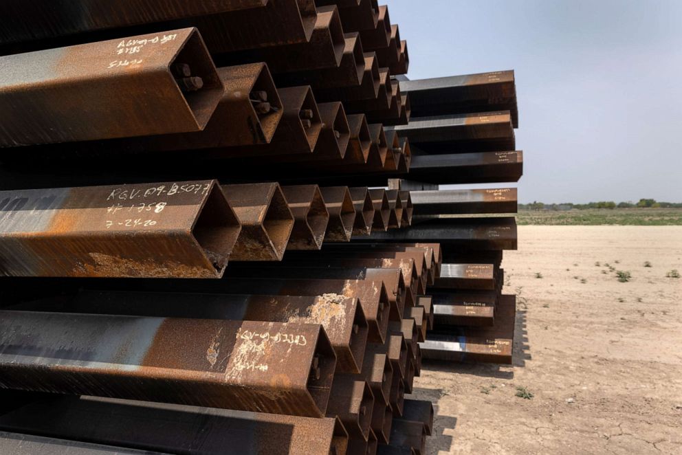 PHOTO: Unused pieces of steel bollard-style wall lay near a portion of unfinished border wall at the U.S.-Mexico border, April 14, 2021, in La Joya, Texas.