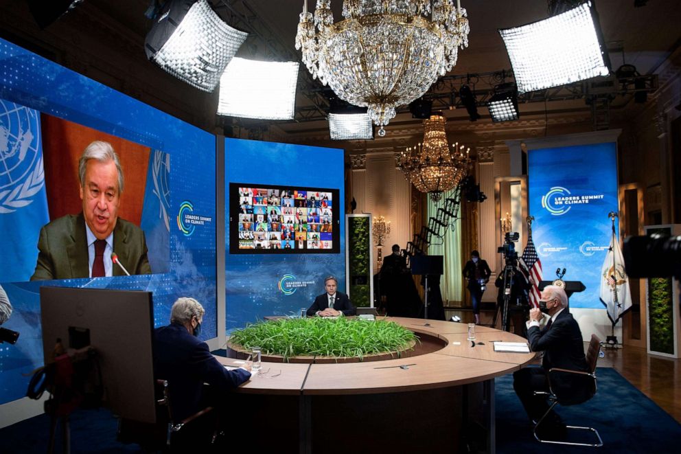 PHOTO: US envoy for climate John Kerry, Secretary of State Antony Blinken, and President Joe Biden listen as United Nations Secretary General Antonio Guterres speaks on screen during a climate change virtual summit, April 22, 2021, in Washington, DC.