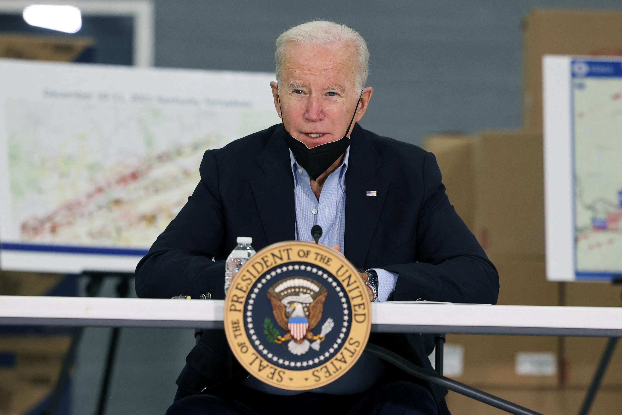 PHOTO: President Joe Biden speaks during a meeting with local leaders and members of Kentucky Emergency Management for a briefing about storm damage from the tornadoes and extreme weather, in Mayfield, Ky., Dec. 15, 2021. 