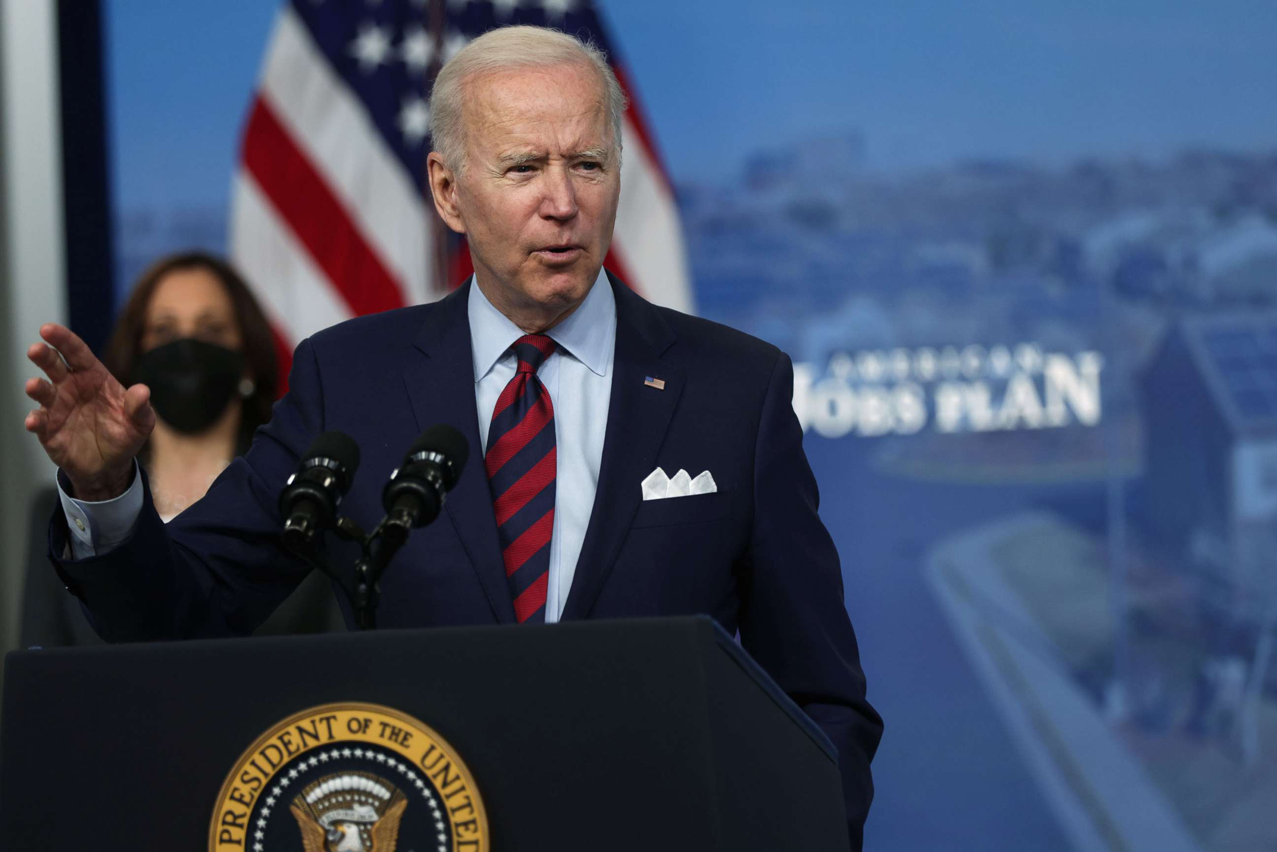 PHOTO: President Joe Biden speaks as Vice President Kamala Harris listens during an event at the South Court Auditorium at Eisenhower Executive Office Building, April 7, 2021, in Washington, D.C.