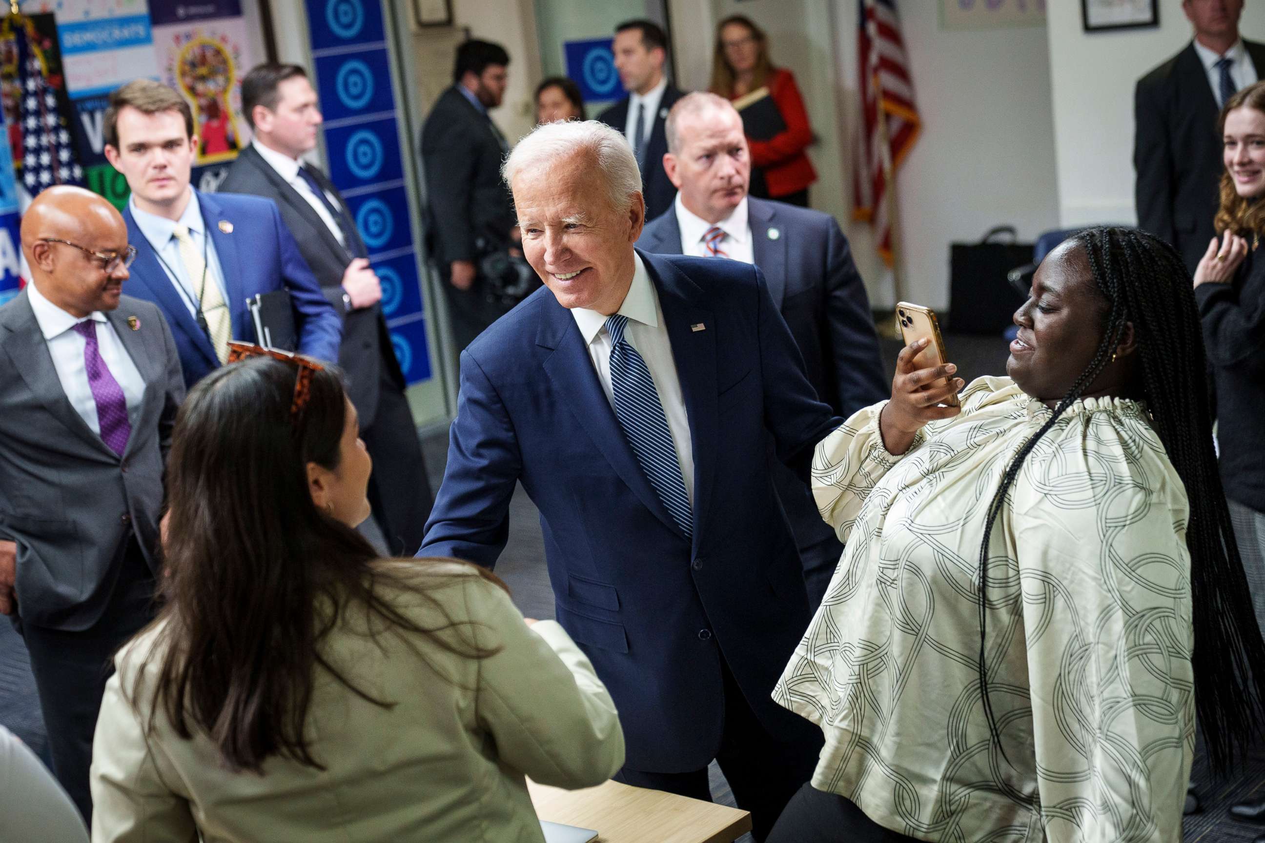 PHOTO: President Joe Biden greets DNC staff and volunteers after speaking at the headquarters of the Democratic National Committee (DNC), Oct. 24, 2022, in Washington, D.C. 