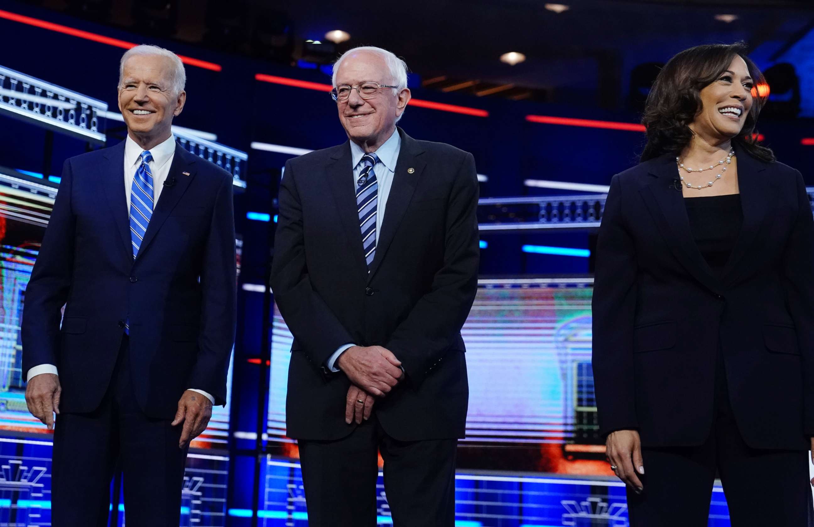 PHOTO: Democratic 2020 election presidential candidates former Vice President Joe Biden and Senator Bernie Sanders pose before the start of the debate in Miami, June 27, 2019.