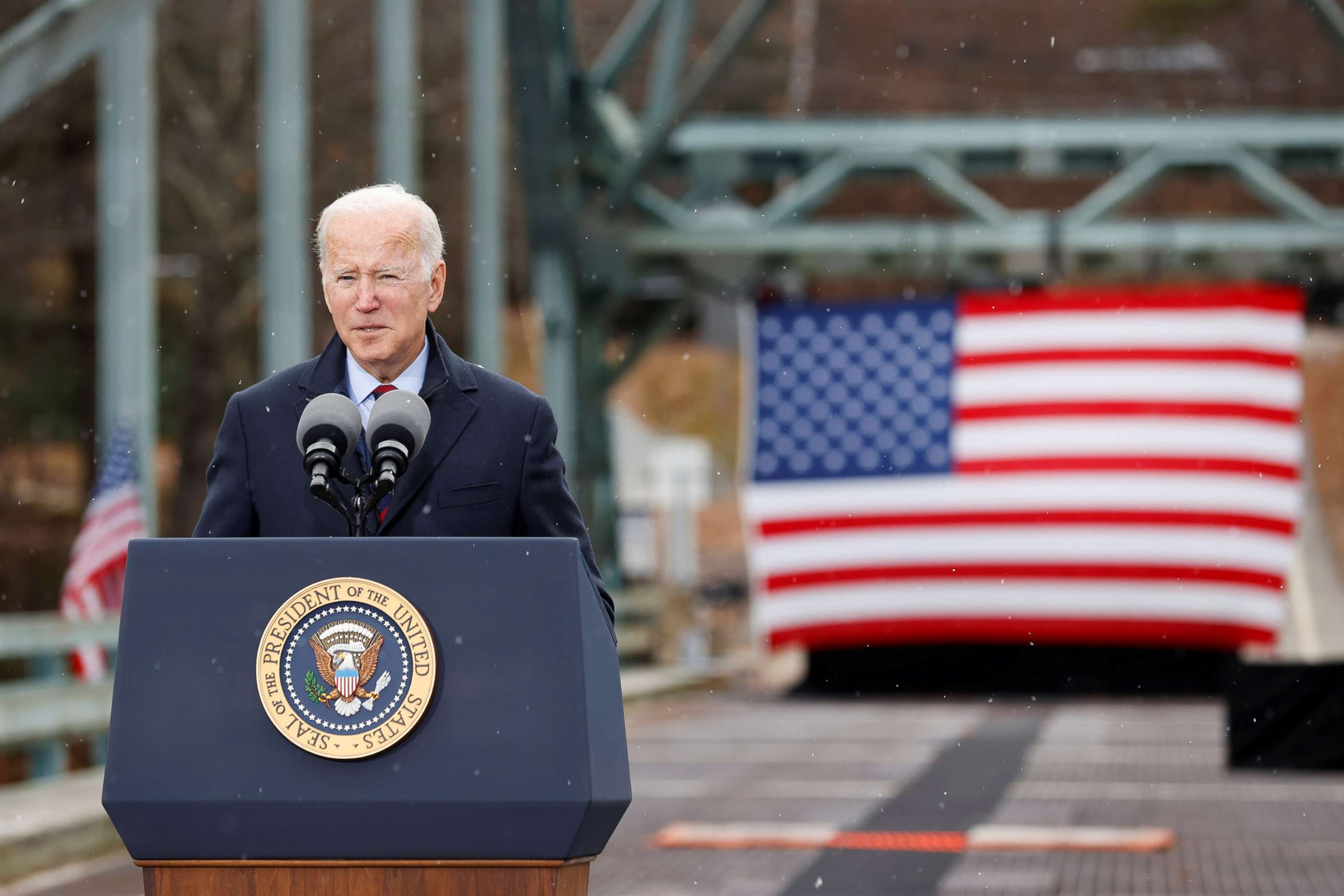 PHOTO: President Joe Biden delivers remarks on infrastructure construction projects from the NH 175 bridge across the Pemigewasset River in Woodstock, N.H., Nov. 16, 2021. 