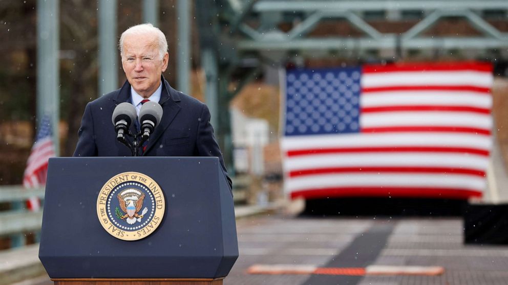 PHOTO: President Joe Biden delivers remarks on infrastructure construction projects from the NH 175 bridge across the Pemigewasset River in Woodstock, N.H., Nov. 16, 2021. 