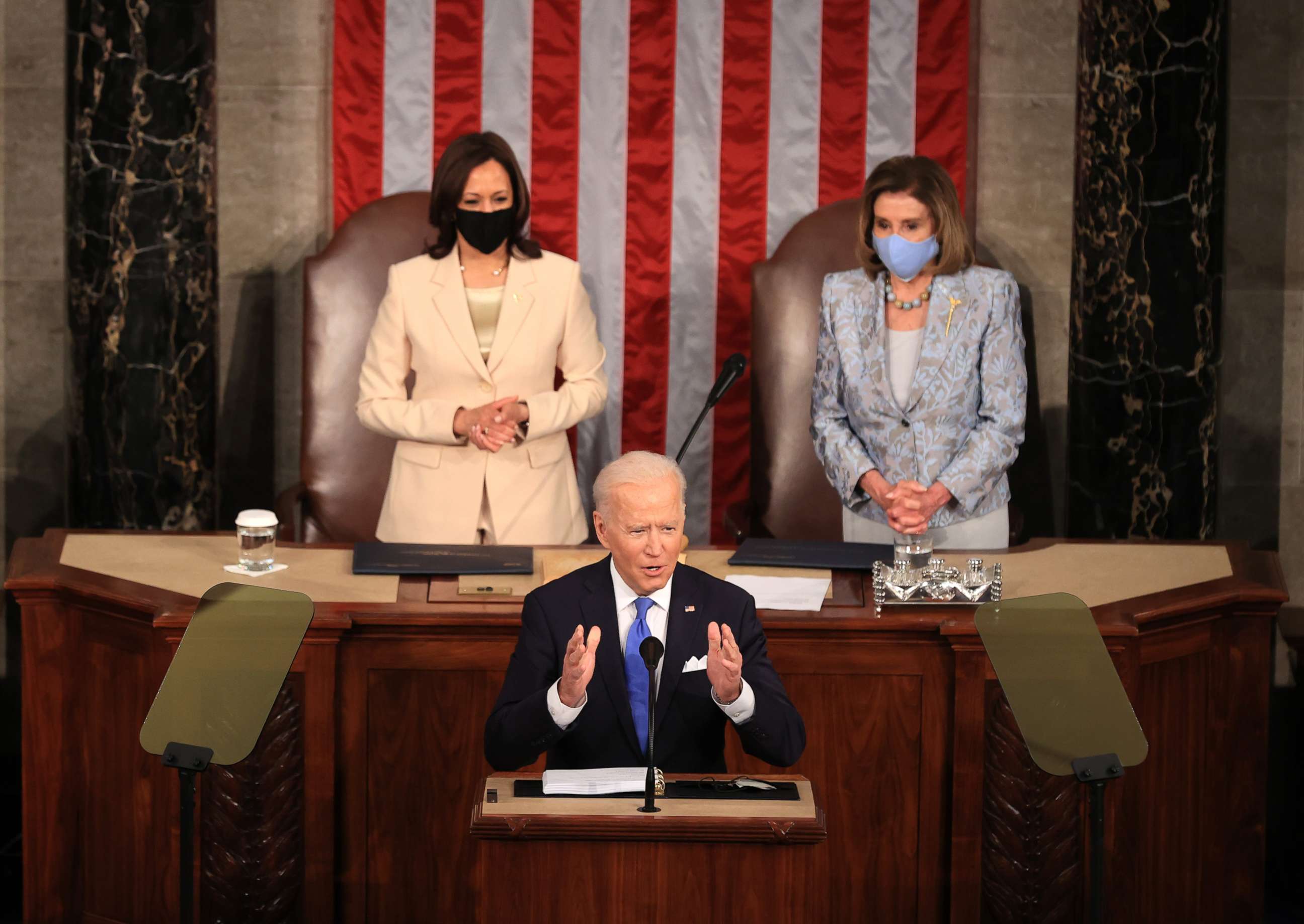 PHOTO: President Joe Biden addresses a joint session of congress as Vice President Kamala Harris and Speaker of the House Rep. Nancy Pelosi look on in the U.S. Capitol, April 28, 2021, in Washington.