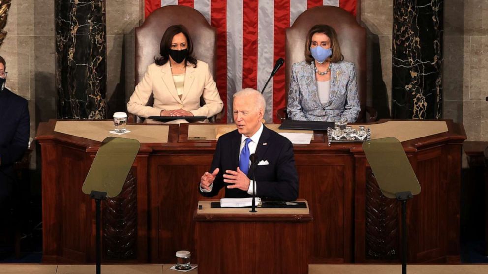 PHOTO: President Joe Biden addresses a joint session of congress as Vice President Kamala Harris and Speaker of the House Rep. Nancy Pelosi look on in the House chamber of the U.S. Capitol, April 28, 2021, in Washington.