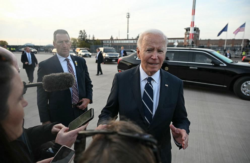 PHOTO: President Joe Biden speaks to journalists before boarding Air Force One at Berlin-Brandenburg Airport in Schoenefeld, southeast of the German capital, on Oct. 18, 2024, at the end of his state visit to Germany.