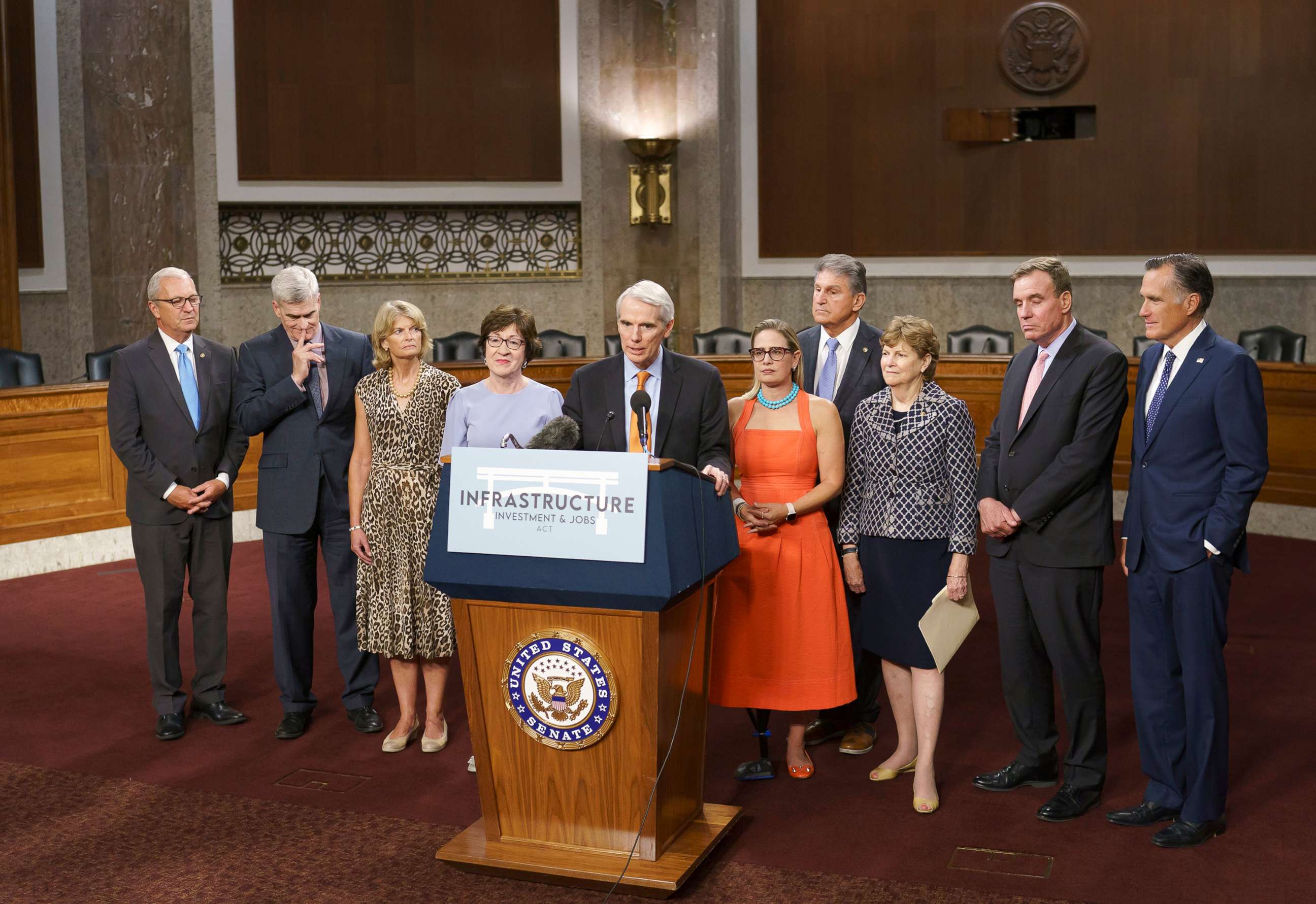 PHOTO: The bipartisan group of Senate negotiators speak to reporters just after a vote to start work on a nearly $1 trillion bipartisan infrastructure package, at the Capitol in Washington, July 28, 2021