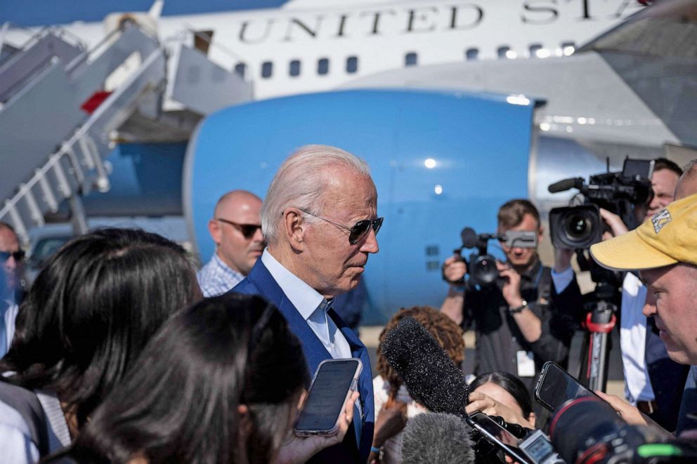 PHOTO: President Joe Biden speaks to members of the media after disembarking Air Force One at Joint Base Andrews in Maryland on July 20, 2022.
