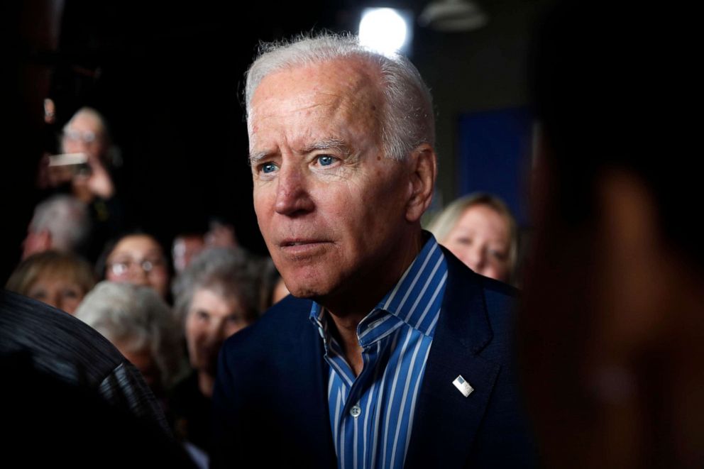 PHOTO:Former Vice President and Democratic presidential candidate Joe Biden greets audience members during a rally in Iowa City, Iowa, May 1, 2019.